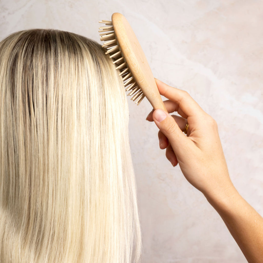 brushing-with-wooden-hair-brush
